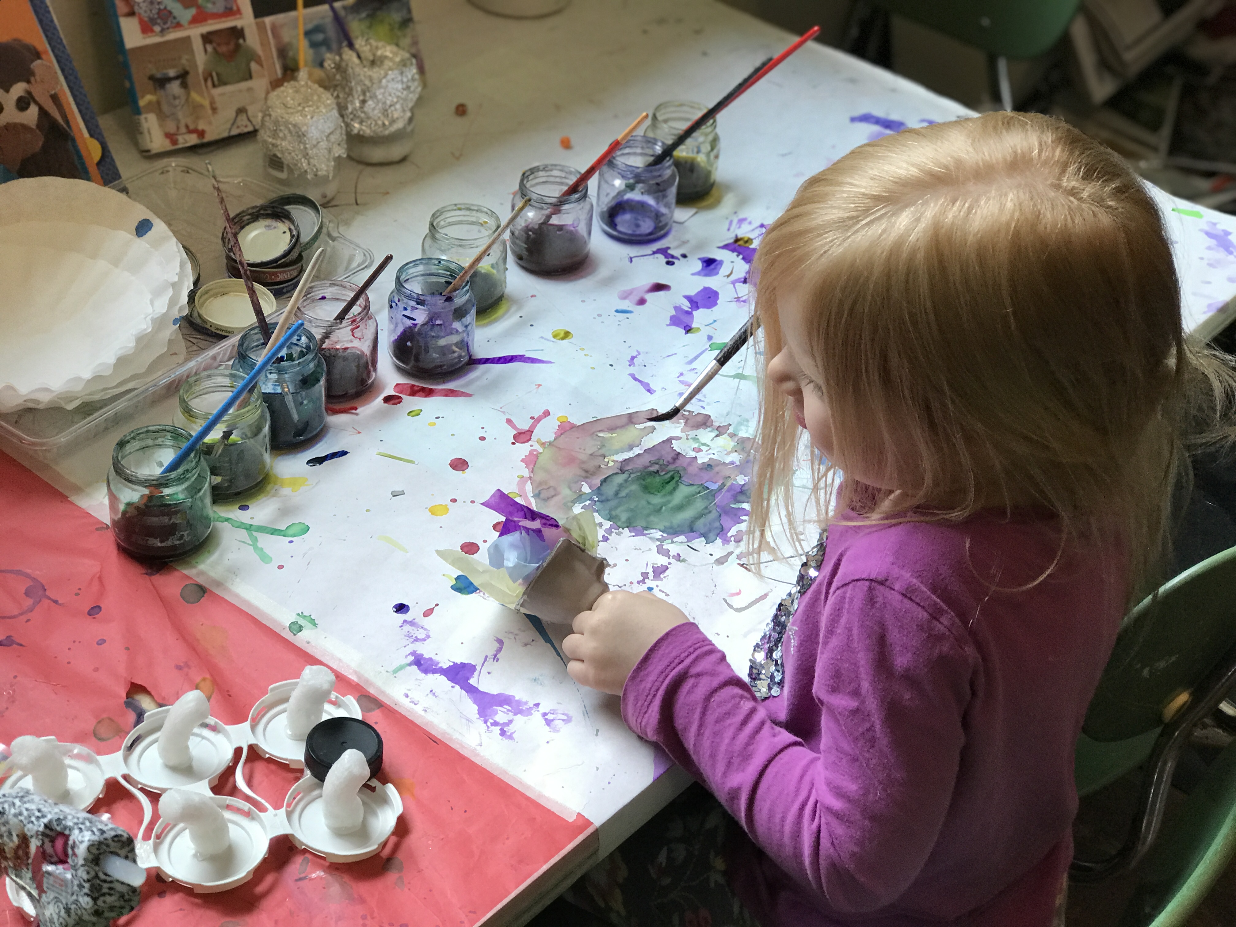 Preschool-aged child watercolor painting.